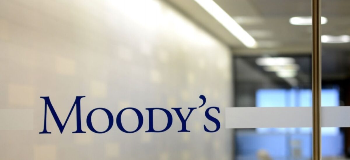 Moody’s logo on office glass wall